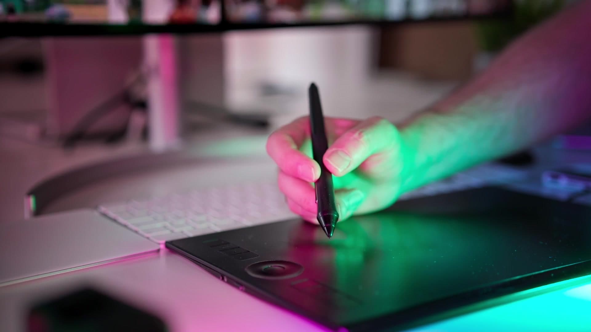 A designer at work on a graphics tablet